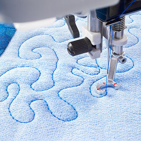 Open-toe free-motion spring foot