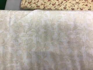 Memoirs-tan roses on cream